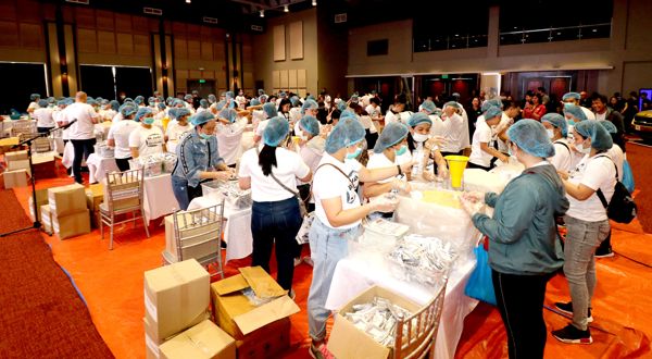 Volunteers packing 7,200++ fortified rice meals that will help feed children from Pampanga and Bataan.