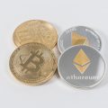 ETH to BTC four round silver-colored and gold-colored Bitcoins