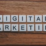 digital marketing artwork on brown wooden surface