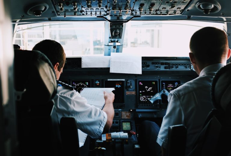 two men inside the plane