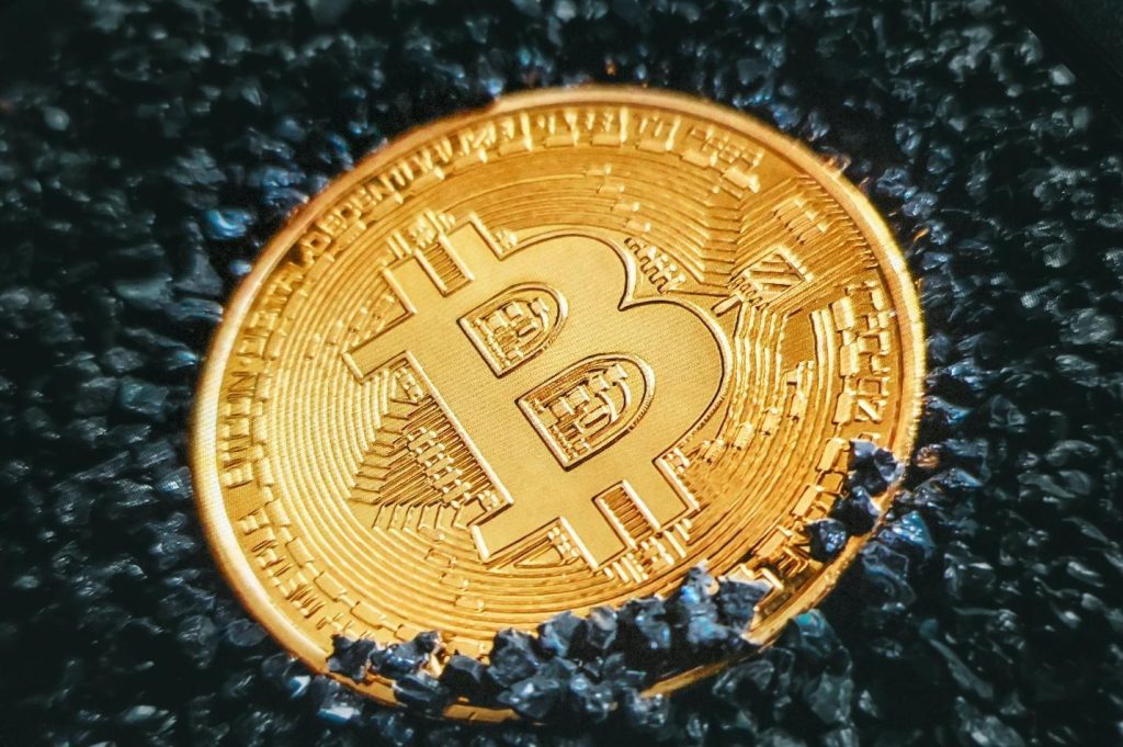 Bitcoin symbol on the ground, representing the digital currency revolution and financial innovation