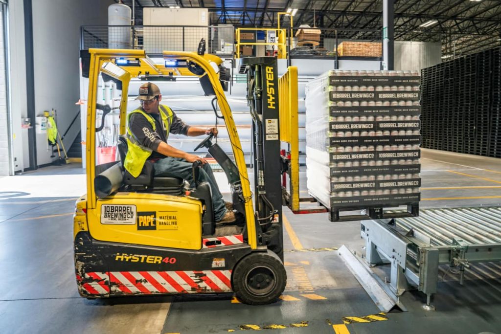 Man driving a forklift