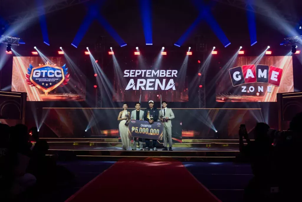 Gamemaster Integrated Inc. President, Mr. Rafael Jasper Vicencio presents the grand prize and trophy to the winner of the GTCC: September Arena